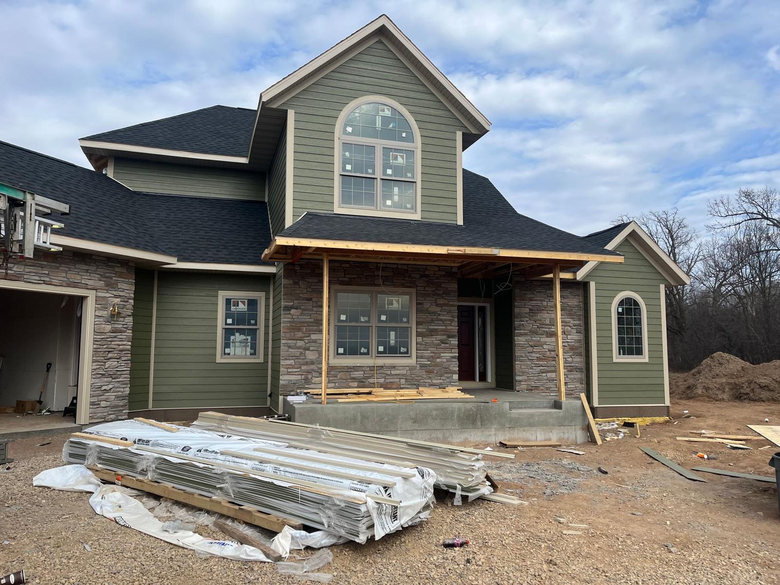New siding on a home by Lakours Construction